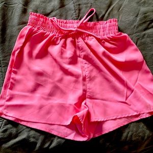 Cute pink summer shorts, never worn. Pull on. Small.